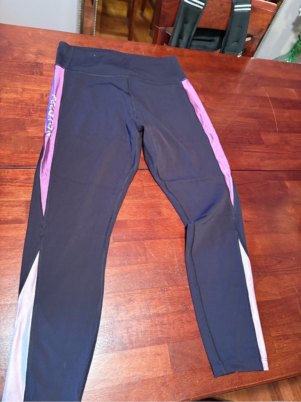 Peloton Black Leggings with Pink Side Panels